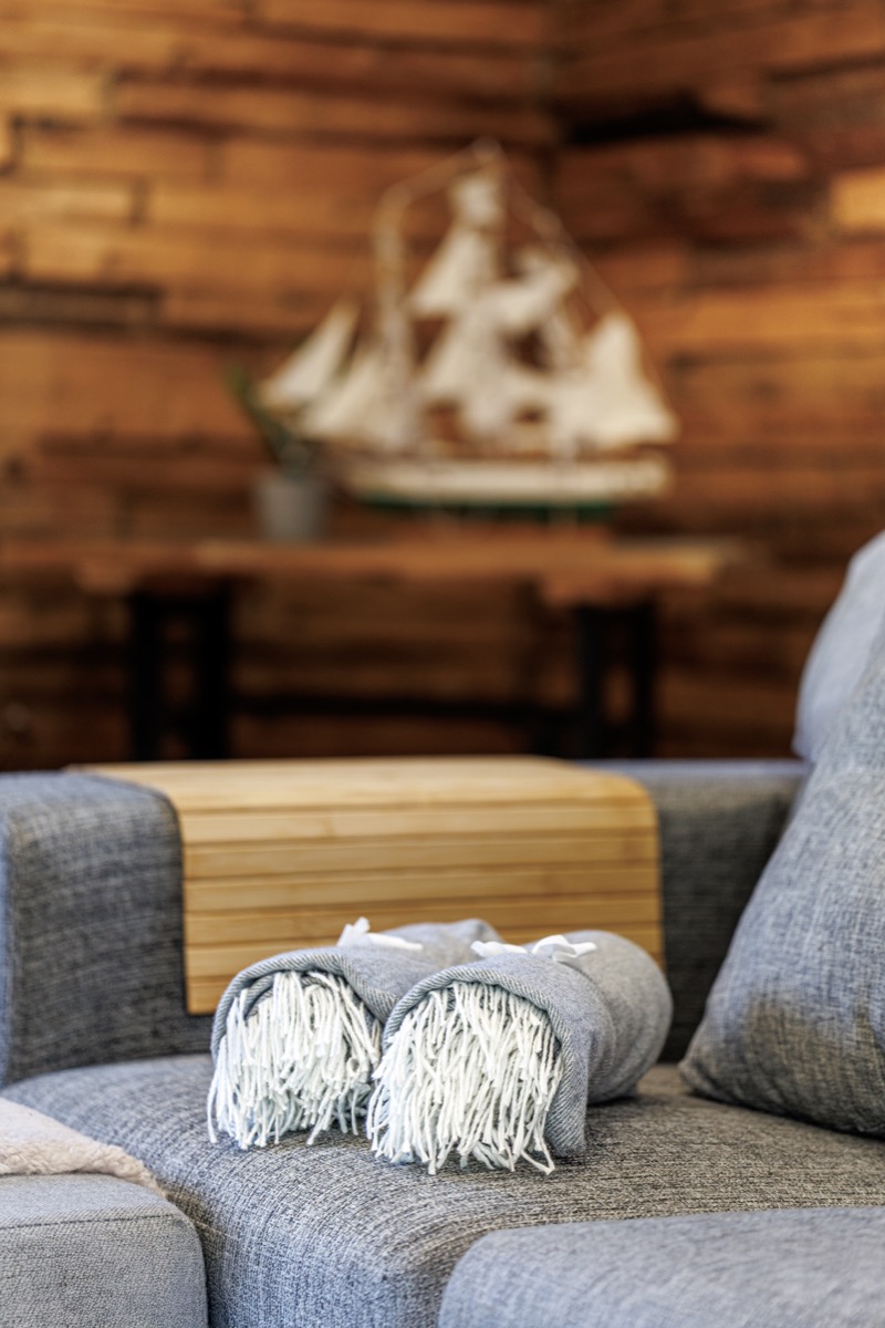 The sofa corner and a model sailing ship